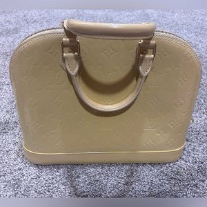 Beige color LV handbag